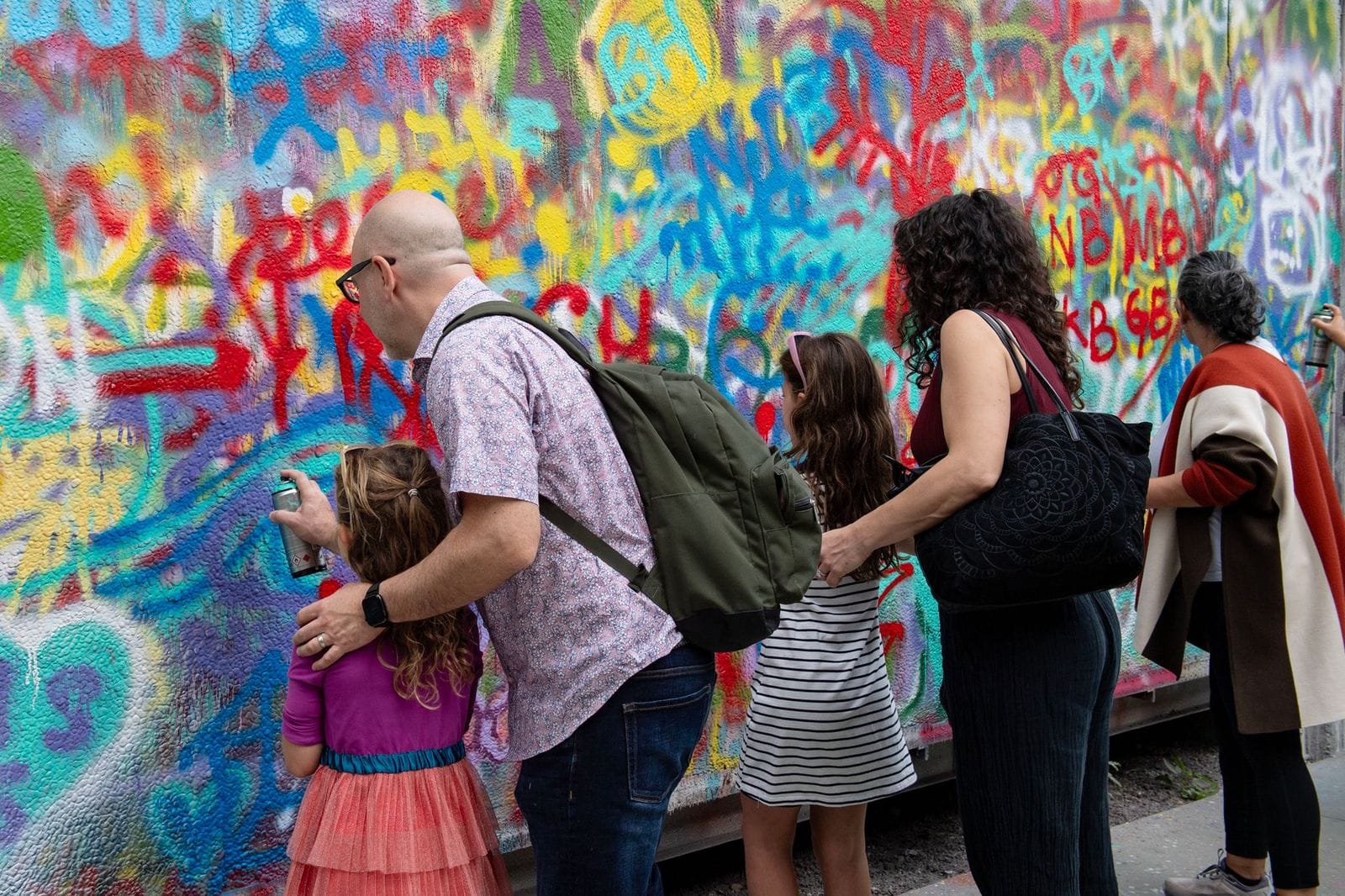 A family painting together at Wynwood Walls during Art Week 2025